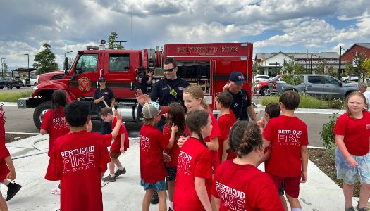 Berthoud Fire firefighters with participants from Firefighter for a Day Camp