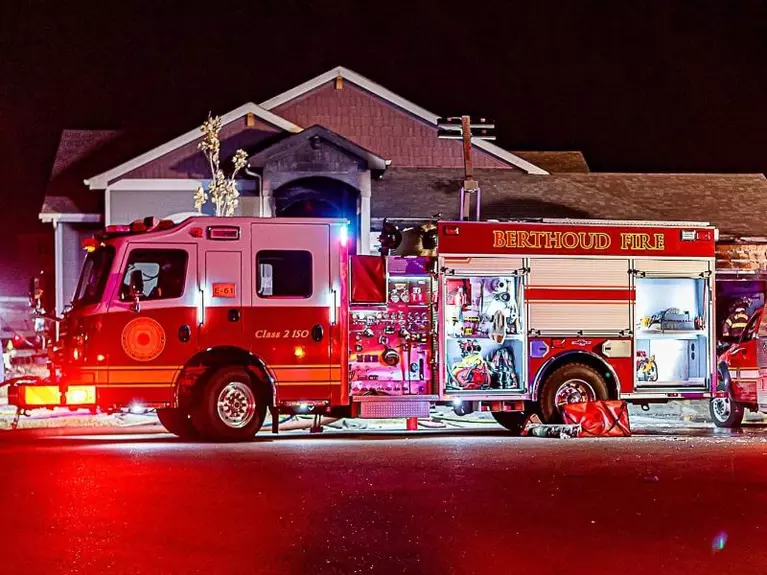 Berthoud Fire engine on scene of a house fire.